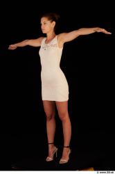 Whole body white dress white heels modeling t pose of Little Caprice